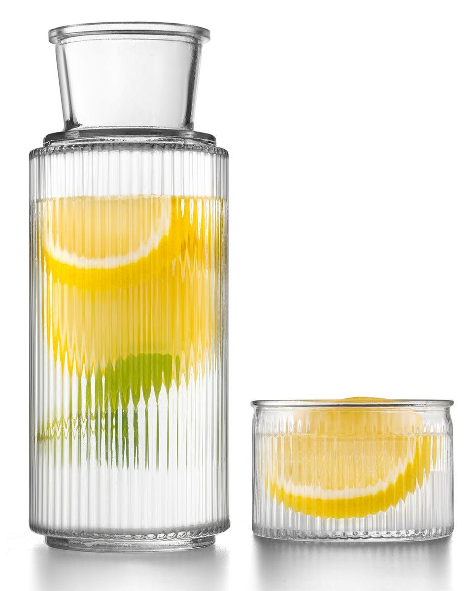 DmmyAlzx bedside carafe 27oz showcases elegant vertical stripes for convenient bedside hydration.