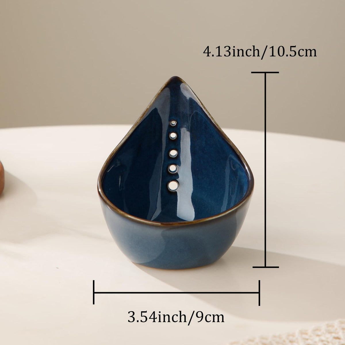 Dneuoir blue pottery herb stripper ideal for quick leaf stripping.