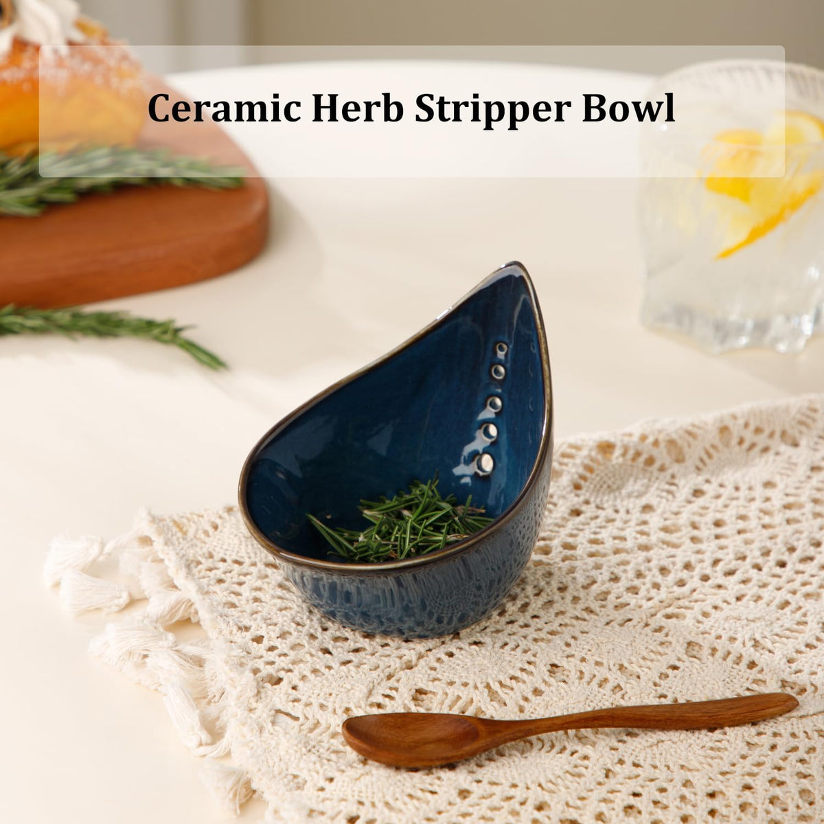 Dneuoir ceramic herb stripper in blue glaze for stylish countertop use.