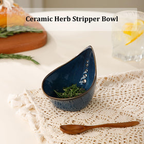 Dneuoir ceramic herb stripper in blue glaze for stylish countertop use.