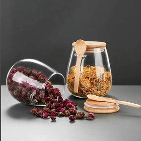 DNIENKGE jar with spoon for easy scooping at the counter