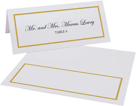 Documents and Designs gold-bordered place card on a formal table setting.