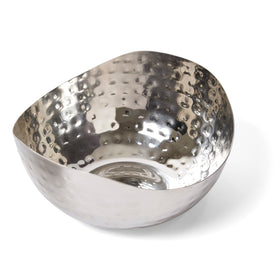 Doma Vita hammered wave dish on coffee table ready for snacks.