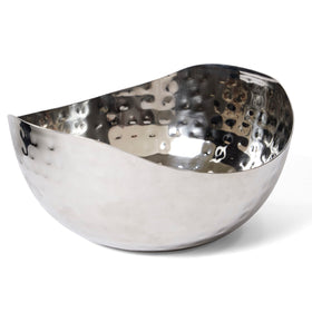 Doma Vita hammered wave dish with potpourri creates elegant decor.