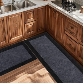 DOMUSTEX kitchen rug under door area shows easy cleaning and fit.