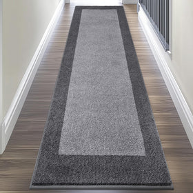 DOMUSTEX rug close-up weave shows soft absorbent fibers for spills.