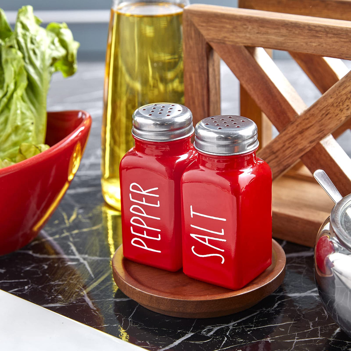 Dopeca red salt and pepper shakers with printed labels for easy identification during cooking