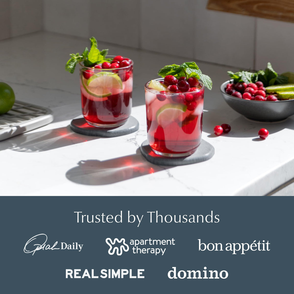 Dorai set of four coasters protecting coffee table surfaces.