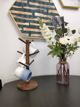 Dorhors rustic mug stand with non-slip feet stays steady on smooth surfaces.