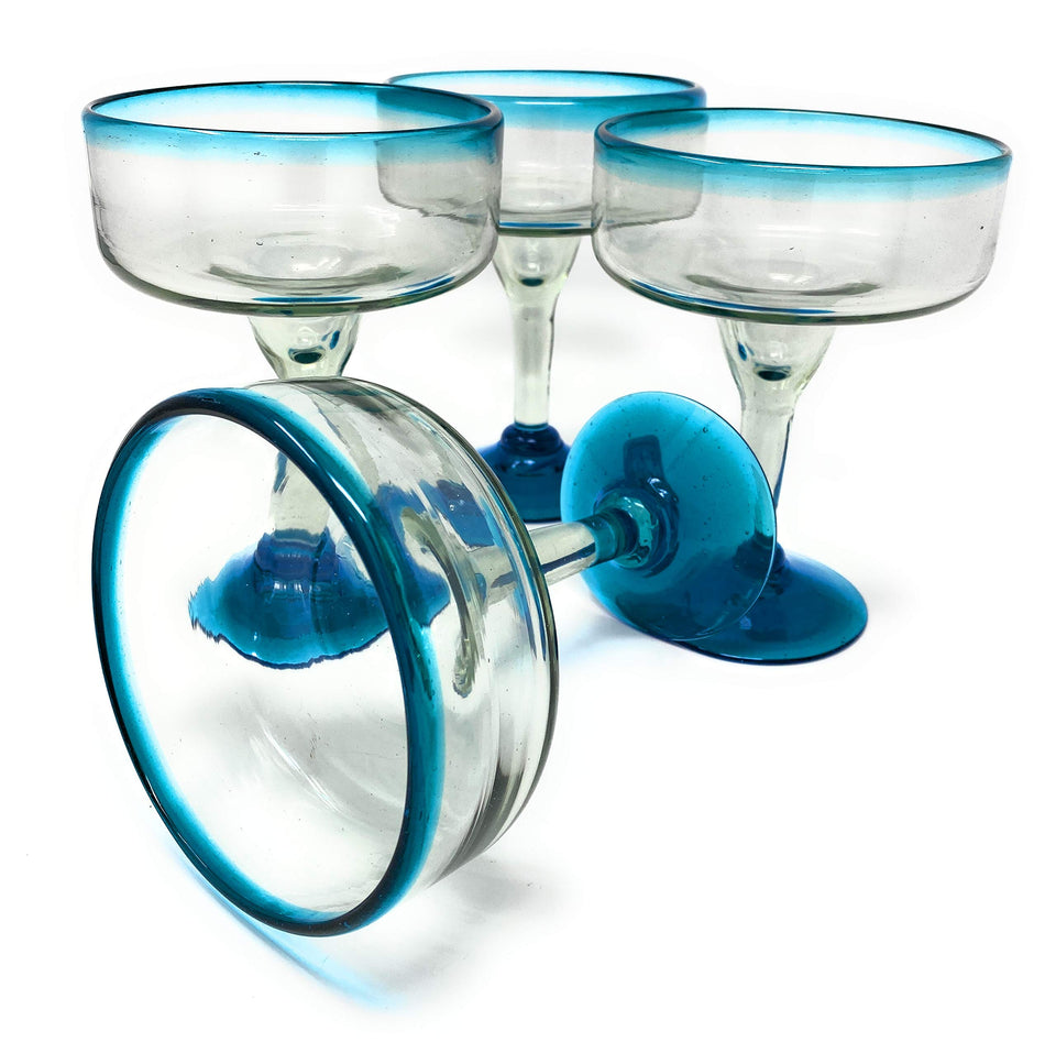 Dos Suenos margarita glasses with aqua rims, perfect for festive gatherings.