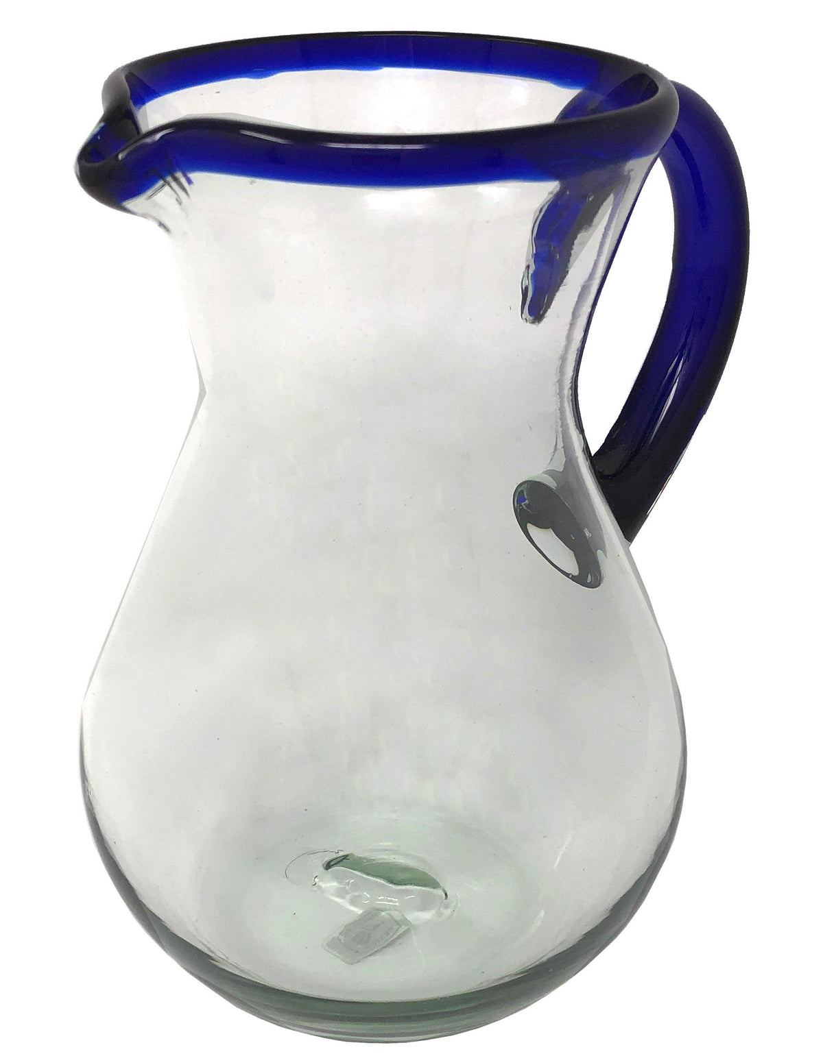 Dos Sueños hand blown pitcher with cobalt blue rim for stylish entertaining.