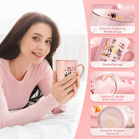 Doublewhale mug with lid and gold spoon for convenient sipping.