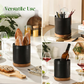 DOWAN black ceramic utensil holder on a counter with farmhouse style.