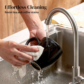 DOWAN dishwasher-safe mugs with glossy black glaze.