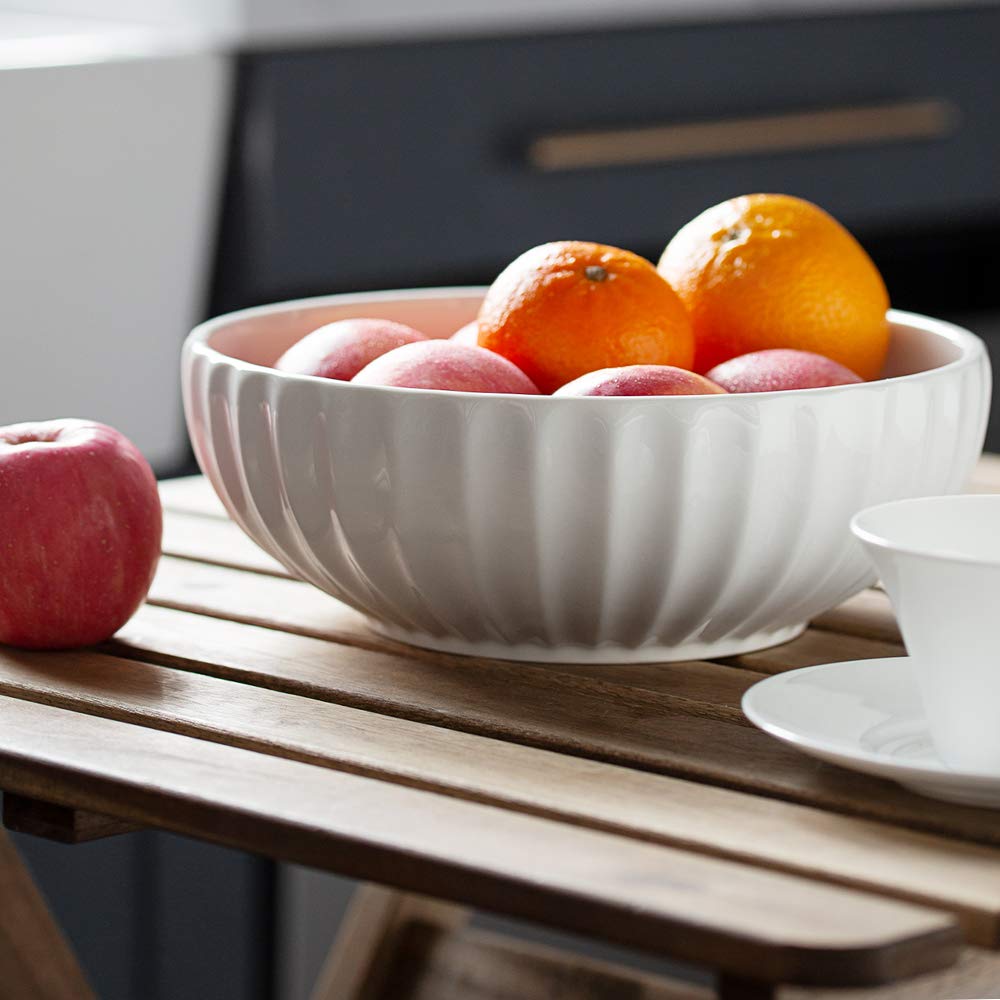 DOWAN entertaining-ready table setting with pumpkin bowls.