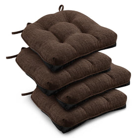 Downluxe tufted brown chair cushions provide plush dining comfort
