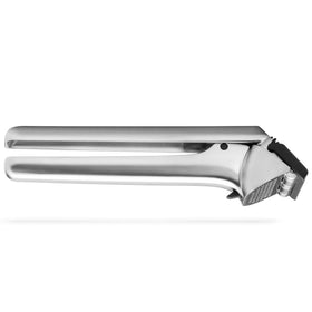 Dreamfarm Garject press and peel in action for quick, mess-free garlic prep.