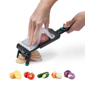 Dreamfarm Nocutu bowl-hook-hanging keeps the slicer organized near the work area.