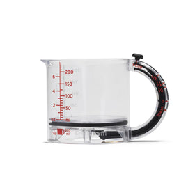 Dreamfarm Upcup shows 1 cup measurement on a clear body for precise cooking.