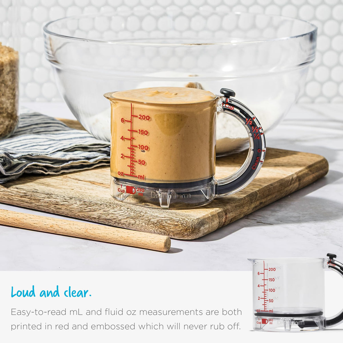 Dreamfarm Upcup clear body with black accents helps see measurements clearly.