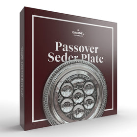 Radiant silver kaarah by The Dreidel Company adds timeless shine to celebrations.