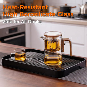 DRNKNSTX Enchanted Tea Pot lid stays in place when pouring at 90 degrees.
