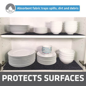 Drymate liner with waterproof backing prevents liquid penetration under shelves and drawers.
