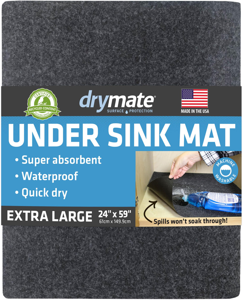 Drymate Premium XL Under Sink Mat in charcoal protecting a cabinet floor from spills