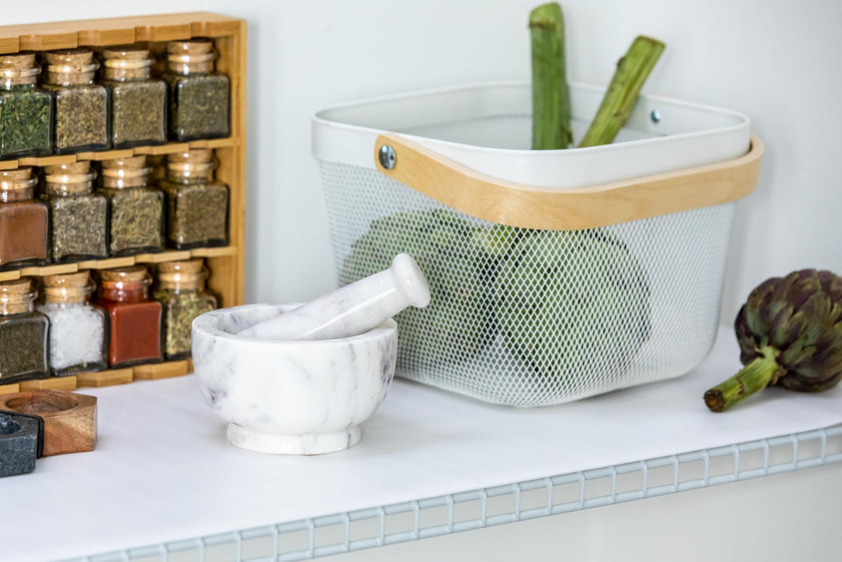Duck EasyLiner blocks crumbs and spills on wire shelves for easier cleaning.
