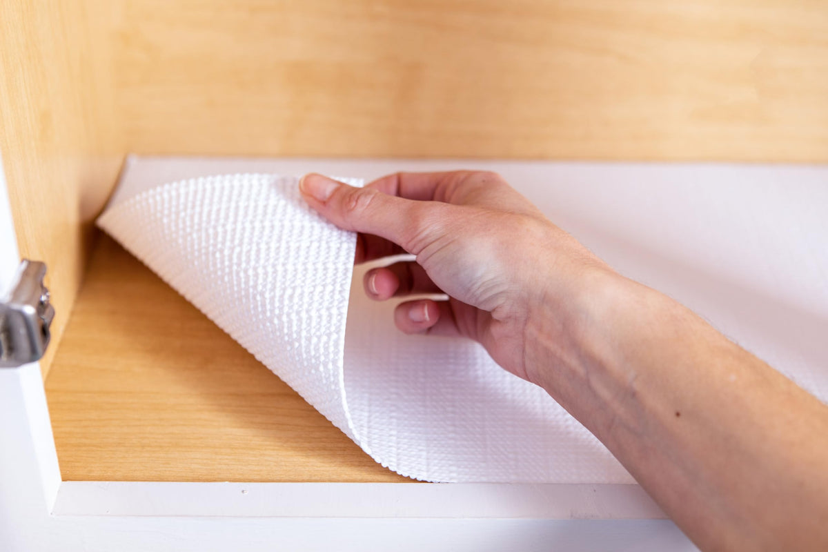 Duck Smooth Top EasyLiner on kitchen shelves helps contain spills and crumbs.