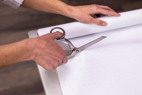 Duck Smooth Top EasyLiner under-sink area protects surfaces and eases cleanup.