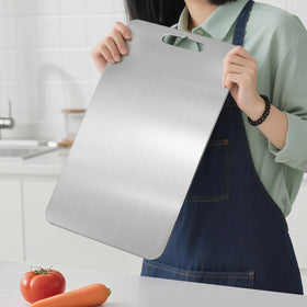 Dujoju titanium cutting board compact, dishwasher-safe, ideal for home and travel.