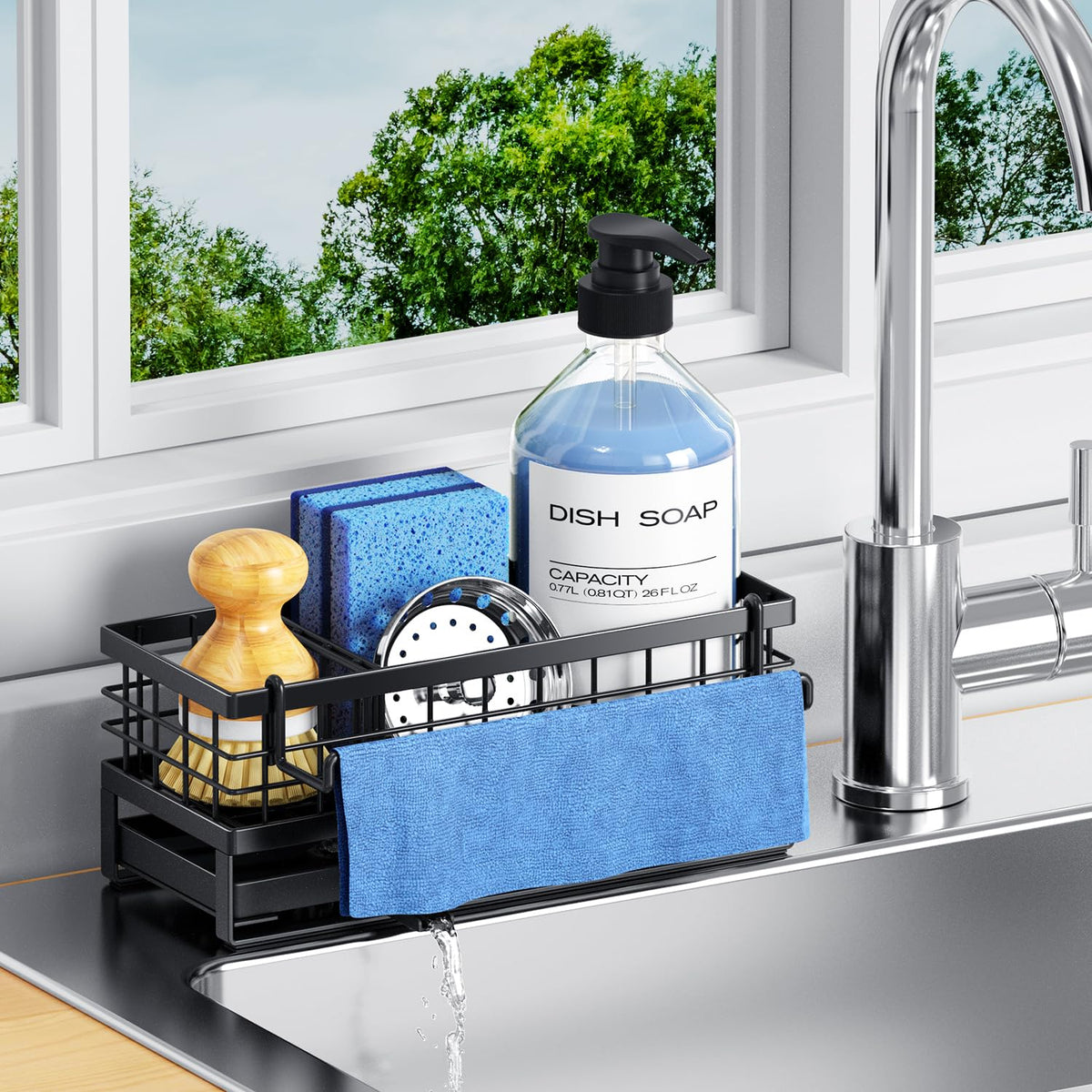 DYFVREN sponge holder with 360° spout directing water into the sink