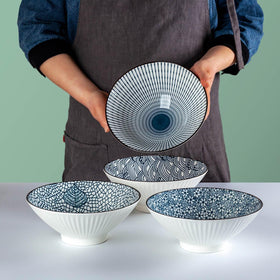 Elegant porcelain bowls by Dyware complement everyday meals.