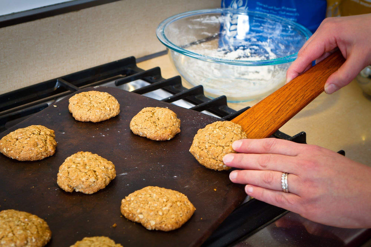 Earlywood cast-iron-scraper-spatula designed for heavy skillet tasks
