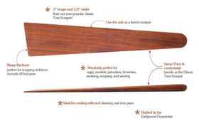 Earlywood egg-turner wood spatula at pan edge for even cooking.