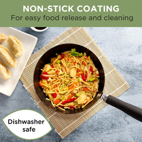Ecolution soft-touch riveted handle enhances grip during cooking.