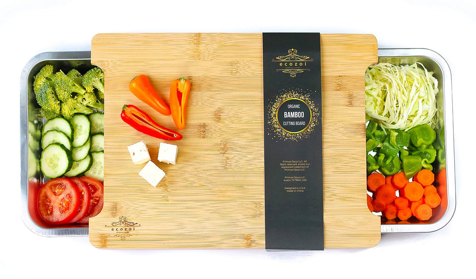 ecozoi bamboo cutting board with two drawers keeps veggie prep organized and mess-free.