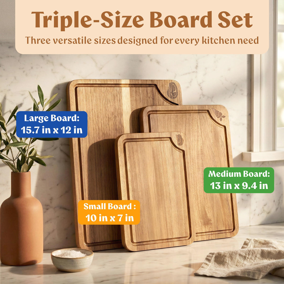 Three sizes of EDELHAUS cutting boards arranged for kitchen tasks