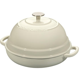 EDGING CASTING dome lid in round design traps steam for crusty loaves.