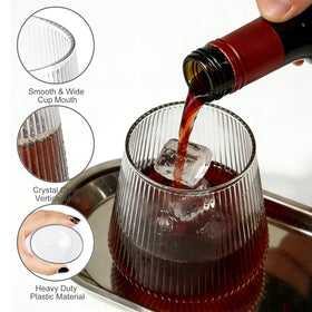 EHLOPMN origami ribbed wine glass at outdoor event.