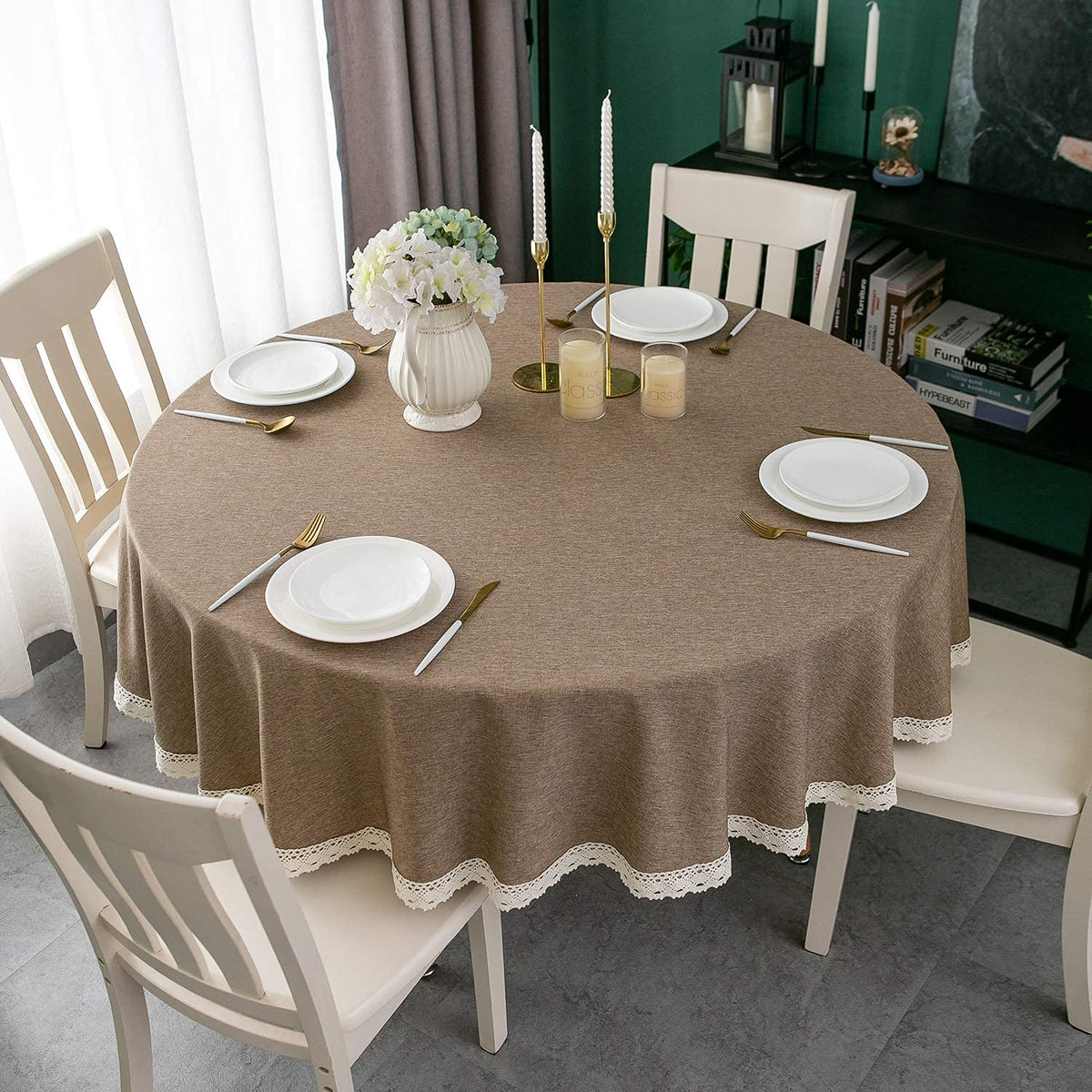 Close-up of waterproof surface showing spill resistance on round tablecloth.