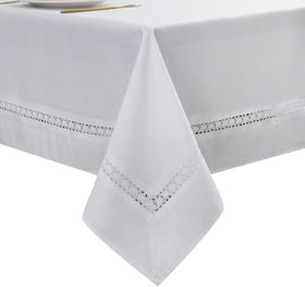 EHouseHome white lace tablecloth draped on a dining table showcasing elegance and protection
