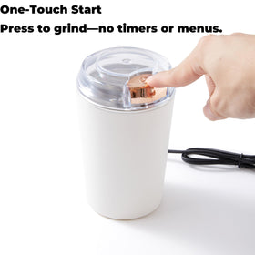 Eiqijci flax-seed grinder in use with one-touch operation.