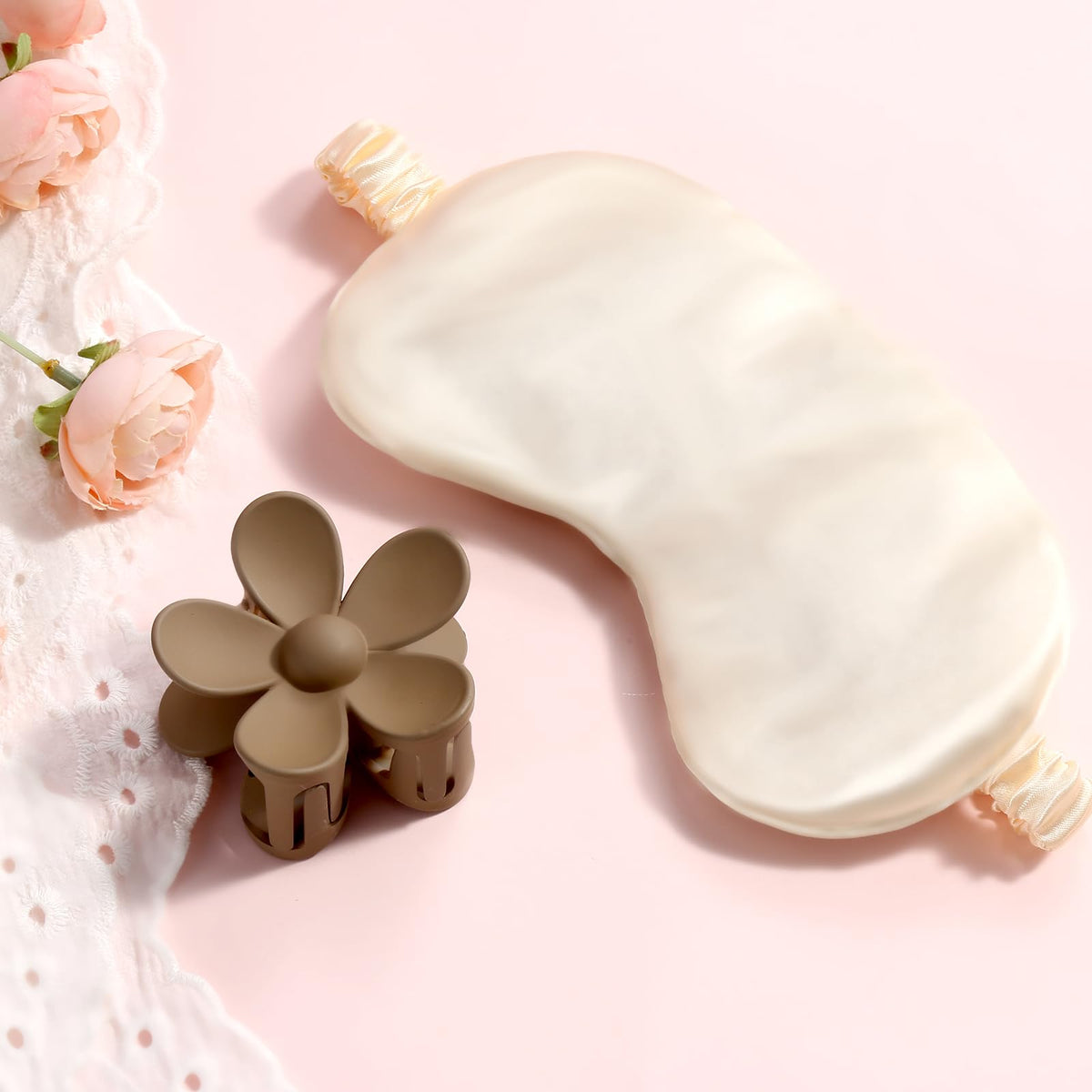 Eirunyx flower hair clip adds a whimsical finishing touch.