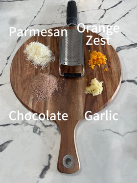 EJKJ Kitchenware grater handle close-up showing ergonomic, non-slip grip.