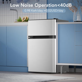 Electactic compact fridge with adjustable glass shelves for flexible storage.