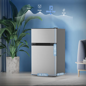 Electactic mini fridge positioned in a bedroom or office setup.