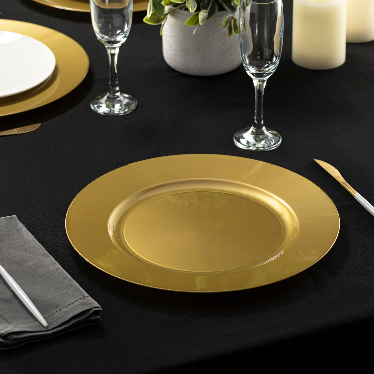 Pack of six Elegant Disposables gold chargers for quick party setup.