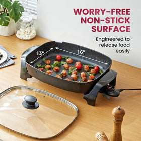 Elite Gourmet EG-6203 vented glass lid for monitoring without splatter.